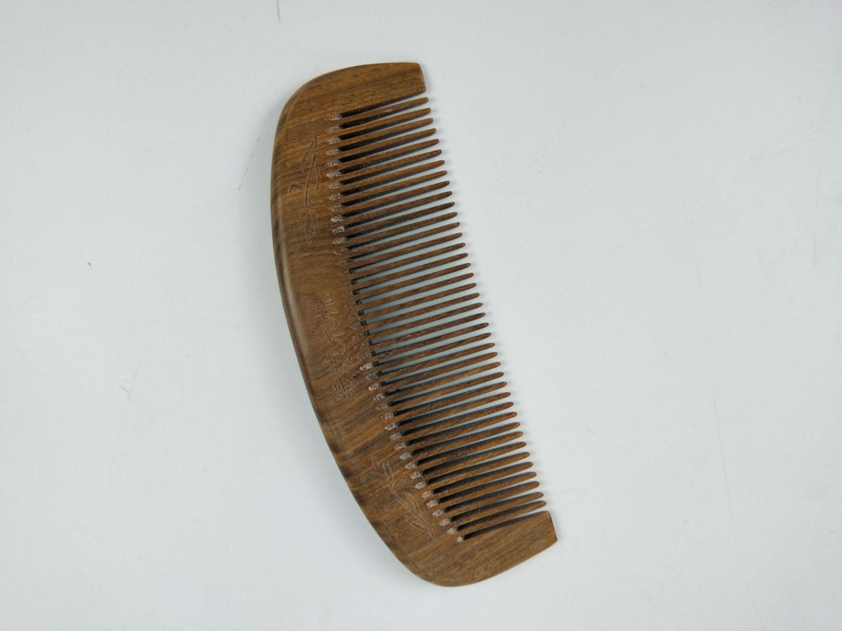 Peine de madera de dientes finos y anchos