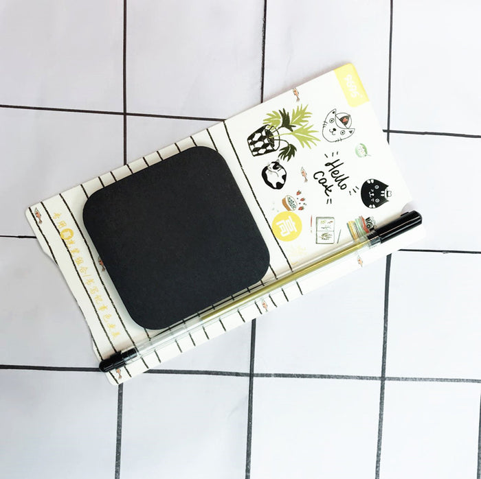Set de notes adhésives noires et stylo lumineux